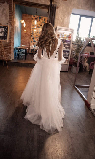 Romantic wedding dress Tveisiya with puffy sleeves - oliviabottega