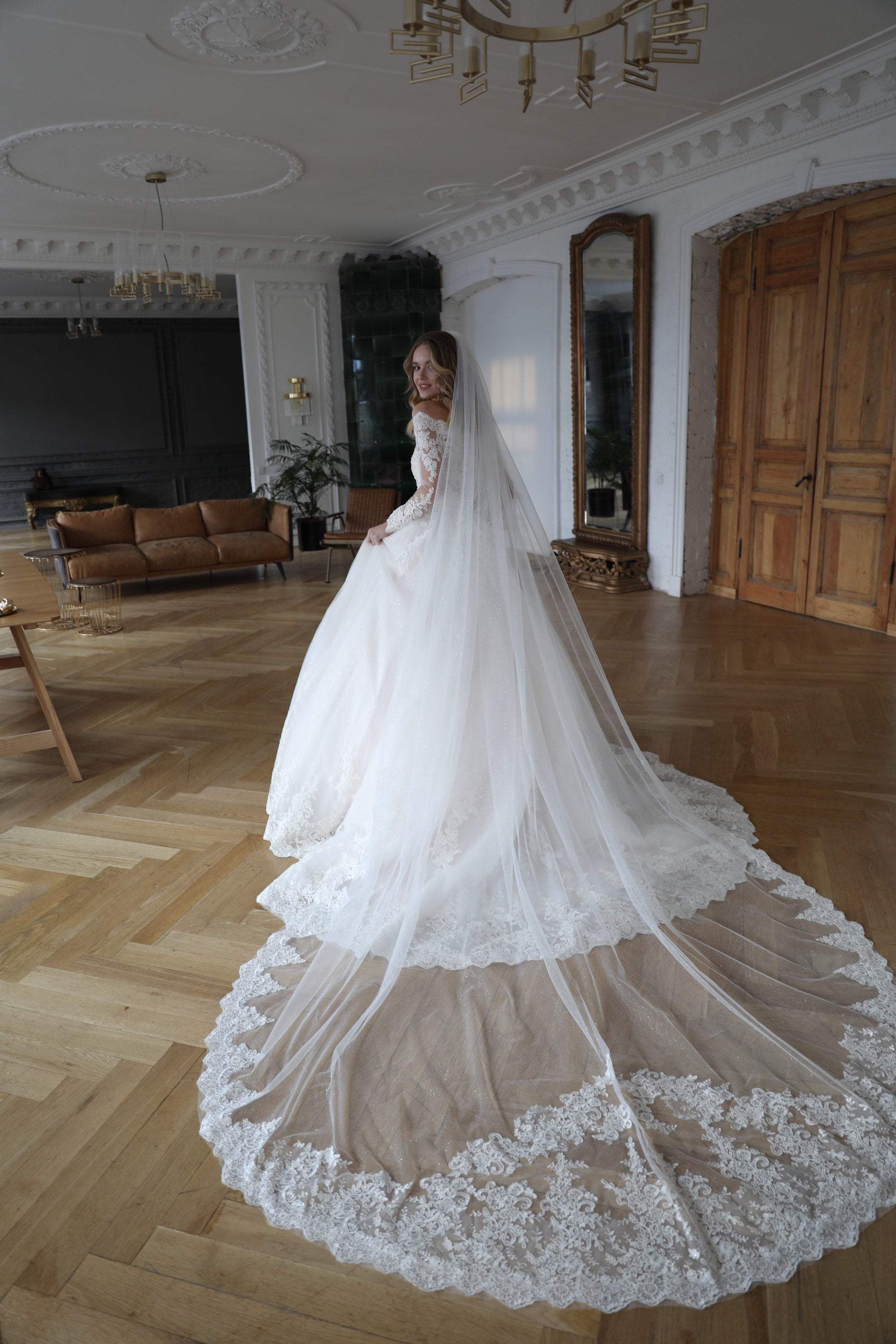 https://www.oliviabottega.com/cdn/shop/products/Ball-wedding-dress-Elizabett-Deco-by-Olivia-Bottega.-Lace-wedding-dress.-Princess-wedding-dress.-Mod-wedding-dress.-OLIVIABOTTEGA-1617995261.jpg?v=1688763417